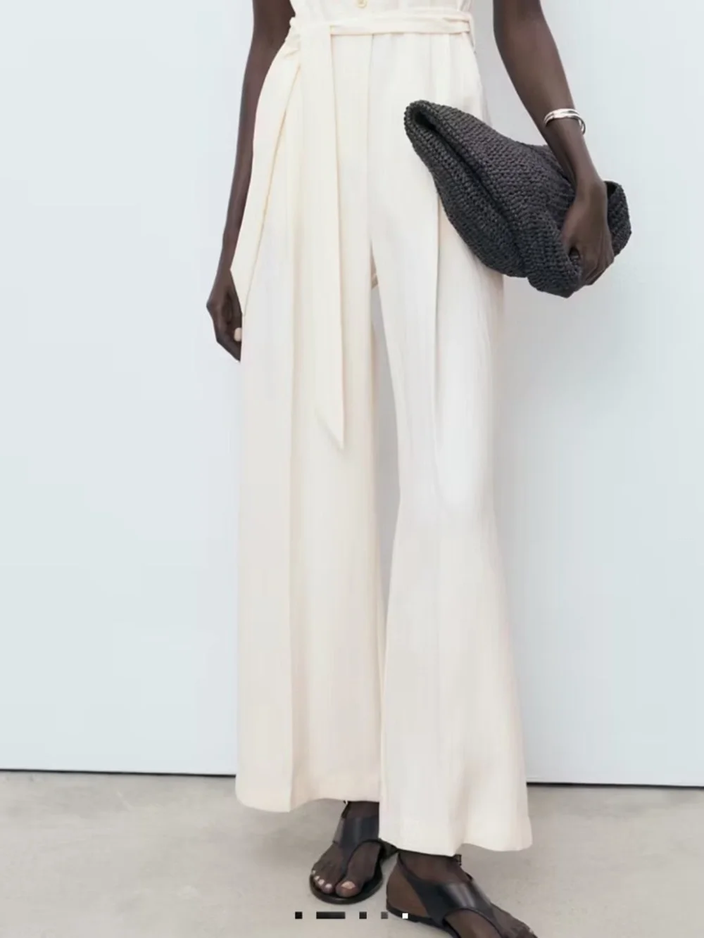 Halter-neck jumpsuit with belt